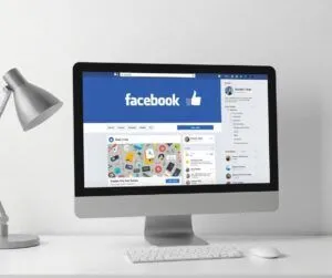 Computer displaying Facebook homepage interface