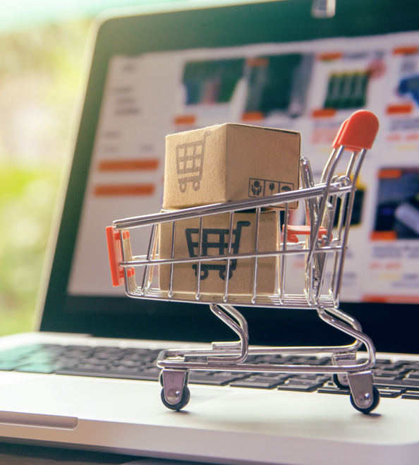 Shopping cart with cardboard box.