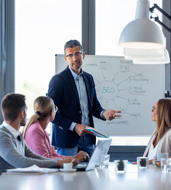 Businessman presenting SEO strategies.
