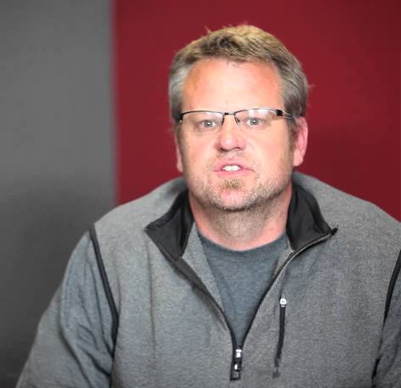 Man in gray jacket