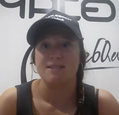 Woman in black cap
